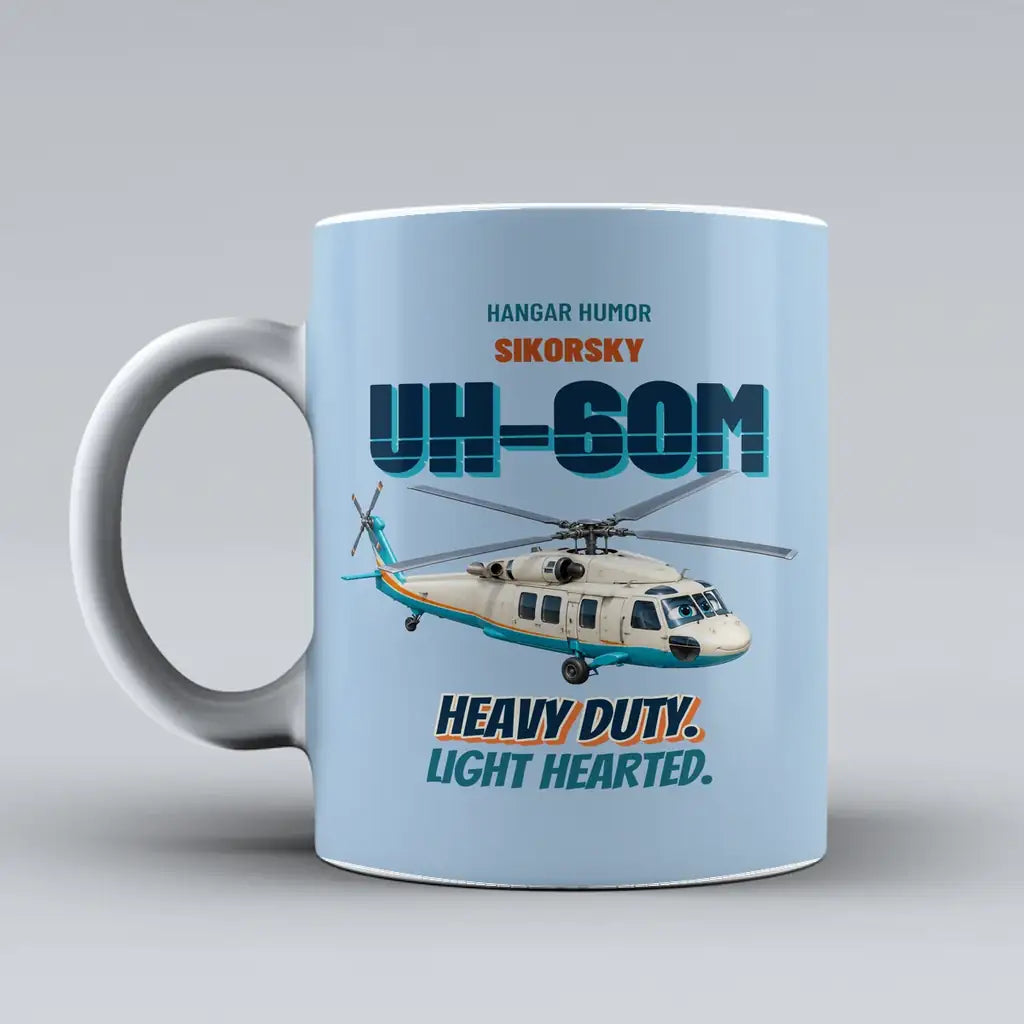 Sikorsky UH-60M Black Hawk - Heavy duty. Light hearted. design on light blue ceramic mug
