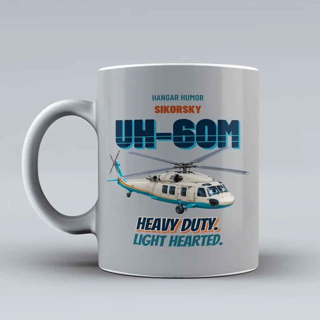 Sikorsky UH-60M Black Hawk - Heavy duty. Light hearted. design on light gray ceramic mug