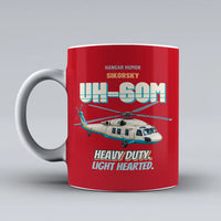 Thumbnail for Sikorsky UH-60M Black Hawk - Heavy duty. Light hearted. design on red ceramic mug