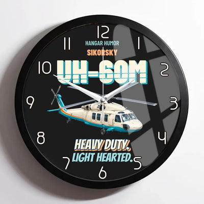 Sikorsky UH-60M Black Hawk - Heavy duty. Light hearted. design on black framed wall clock