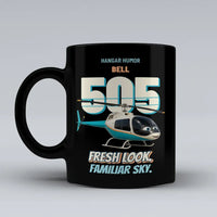 Thumbnail for Bell 505 - Fresh look. Familiar sky. design on black ceramic mug