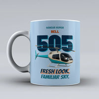 Thumbnail for Bell 505 - Fresh look. Familiar sky. design on light blue ceramic mug