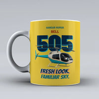 Thumbnail for Bell 505 - Fresh look. Familiar sky. design on yellow ceramic mug