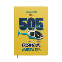 Thumbnail for Bell 505 - Fresh look. Familiar sky. design on yellow notebook