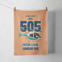 Thumbnail for Bell 505 - Fresh look. Familiar sky. design on orange towel