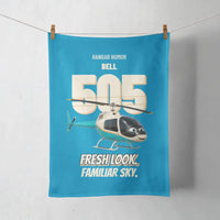 Thumbnail for Bell 505 - Fresh look. Familiar sky. design on turquoise towel