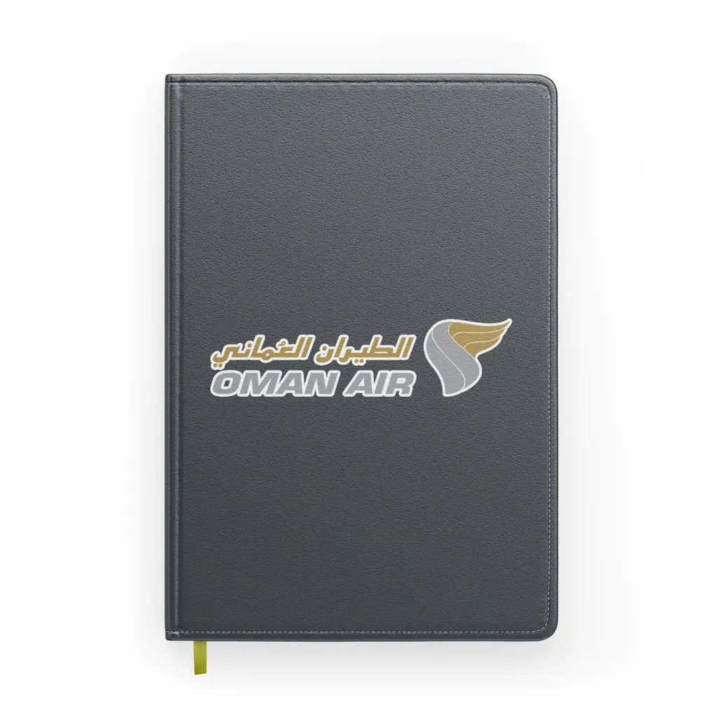 Oman Airlines design on gray notebook