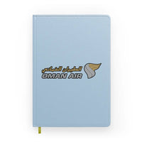 Thumbnail for Oman Airlines design on light blue notebook
