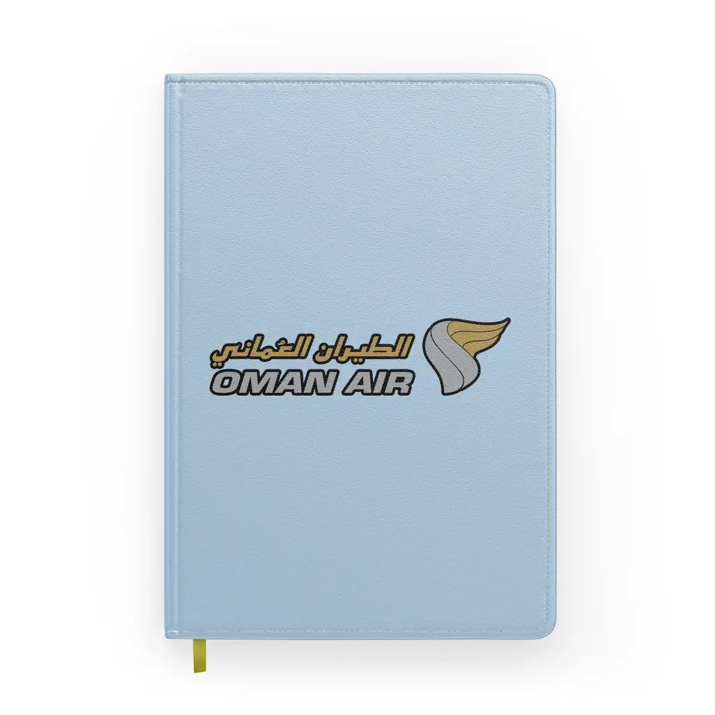 Oman Airlines design on light blue notebook