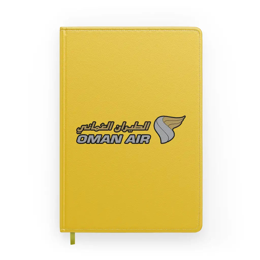 Oman Airlines design on yellow notebook
