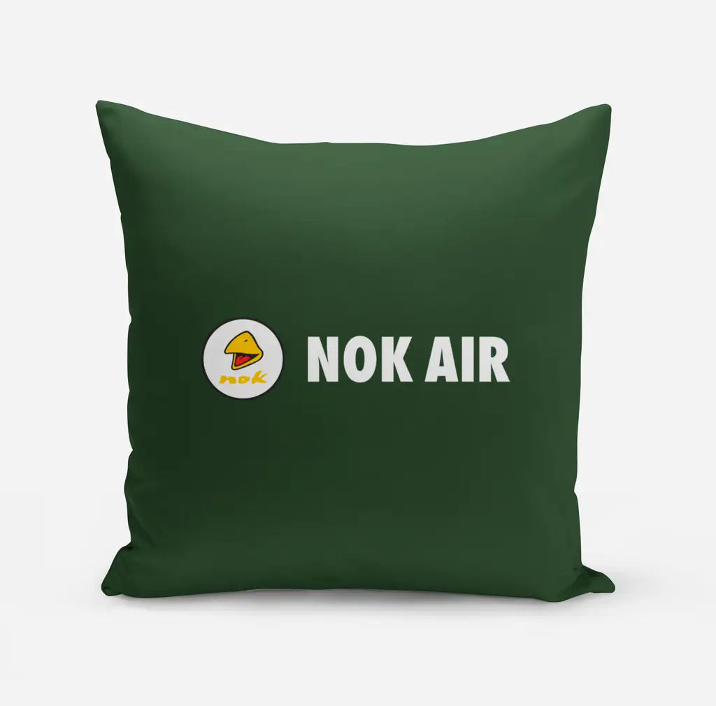 Nok Airlines design on dark green pillow