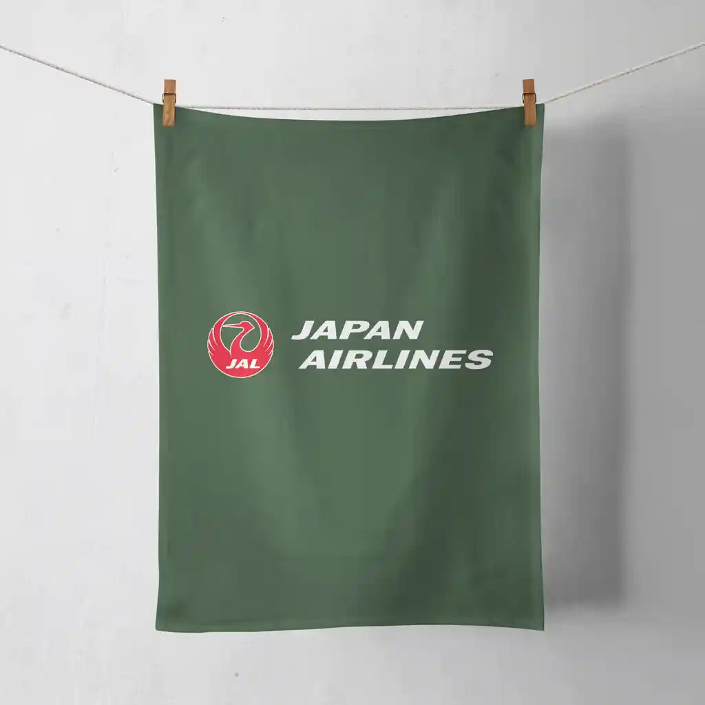 Japan Airlines design on dark green towel