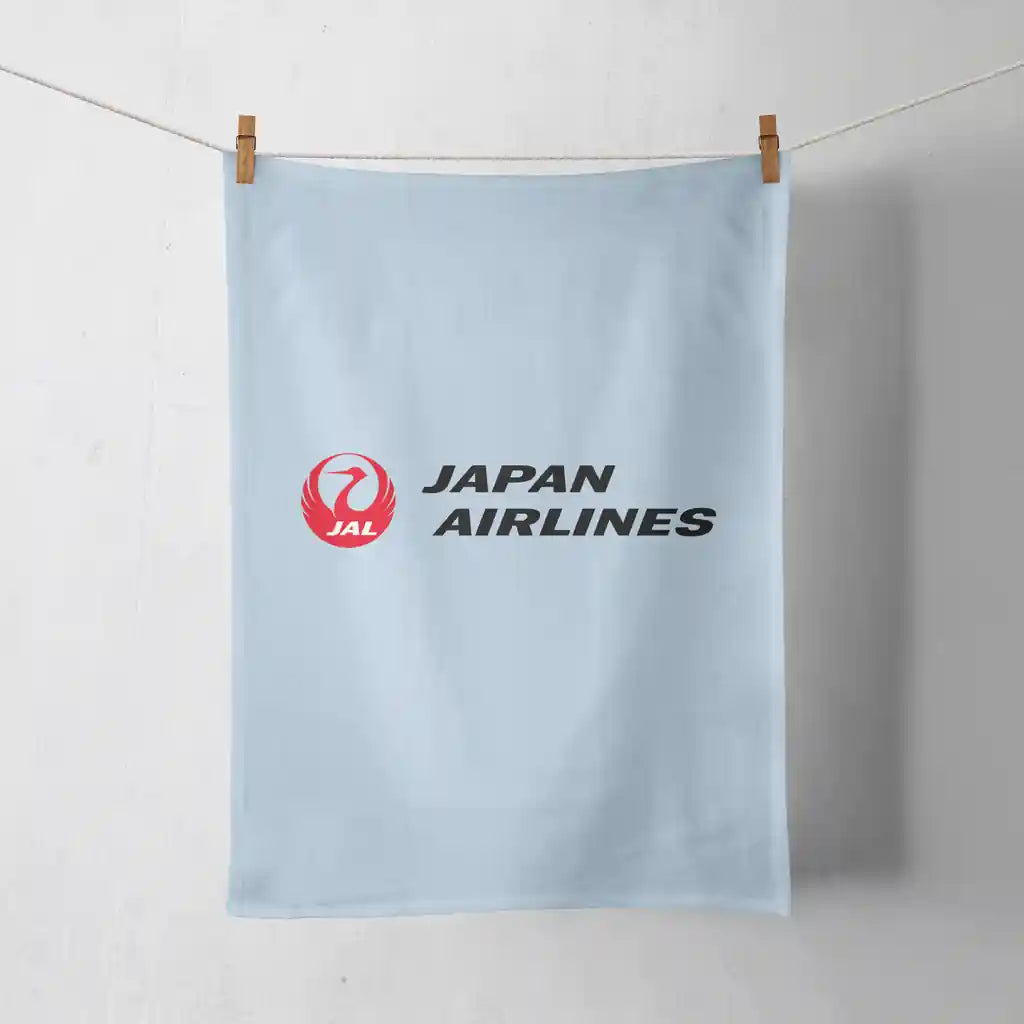 Japan Airlines design on light blue towel