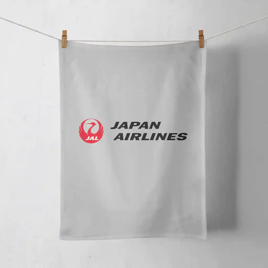 Japan Airlines design on light gray towel