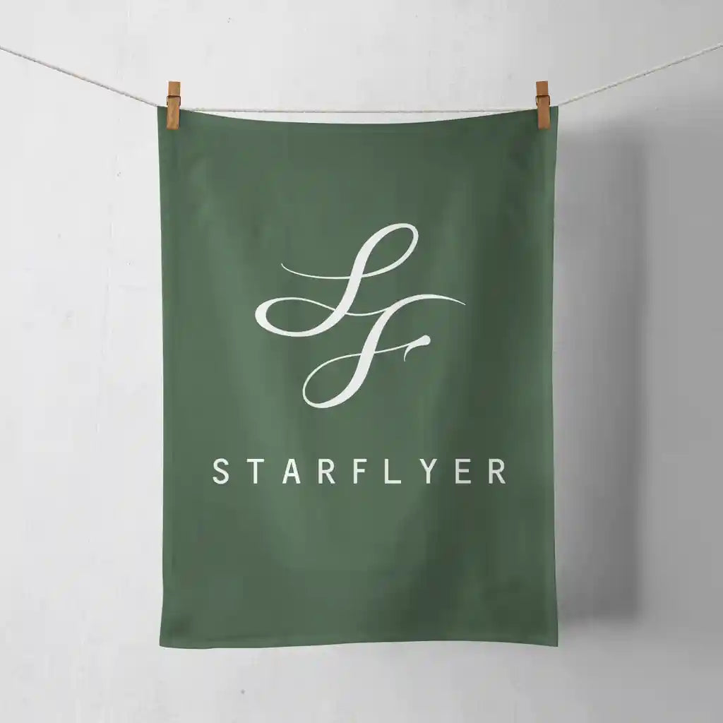 StarFlyer Airlines design on dark green towel