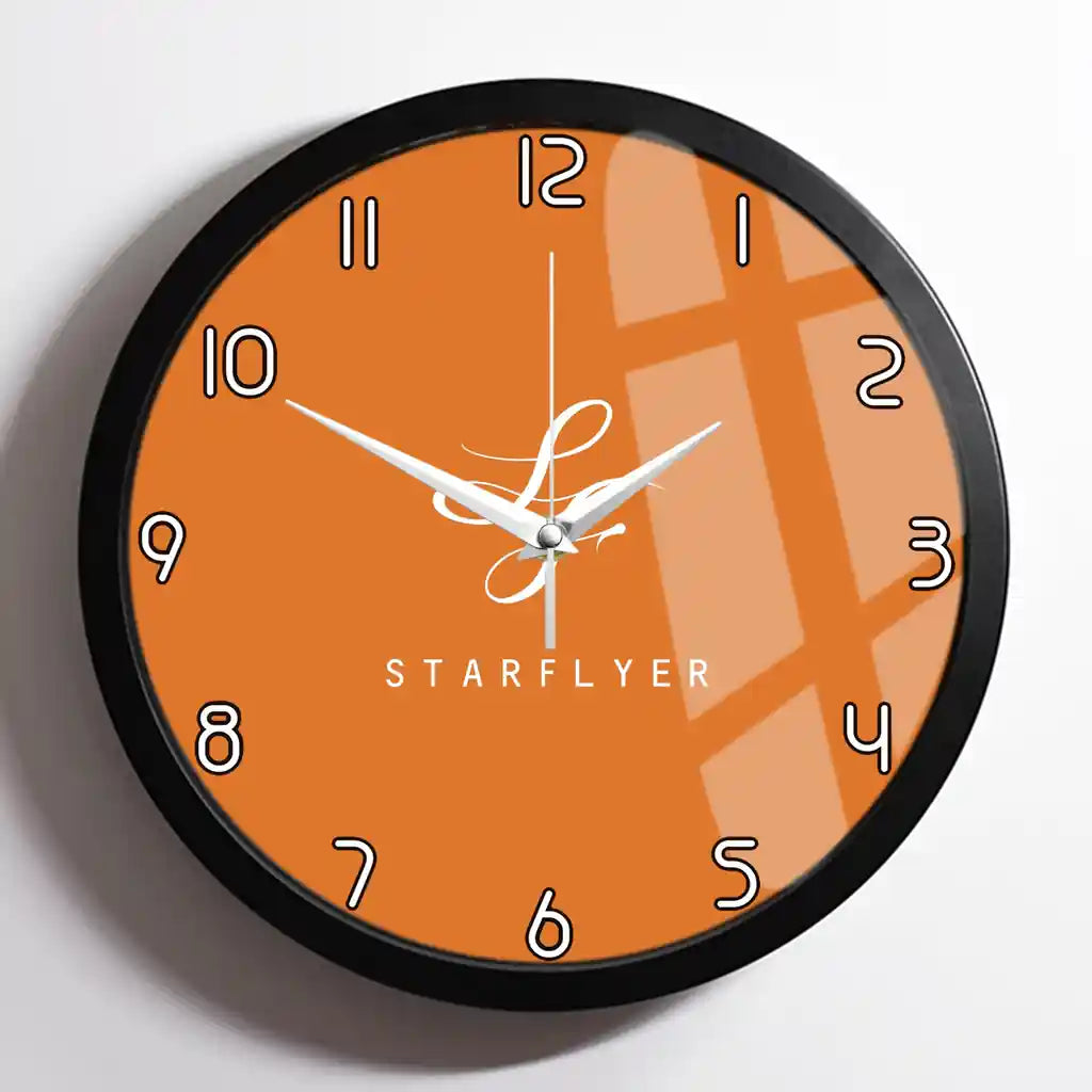 StarFlyer Airlines design on orange framed wall clock