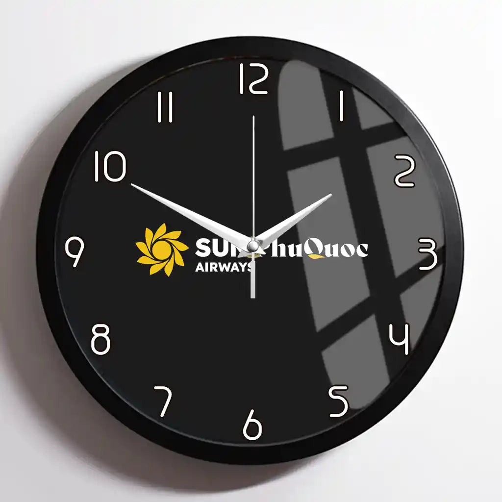 Sun Phu Quoc Airways design on black framed wall clock