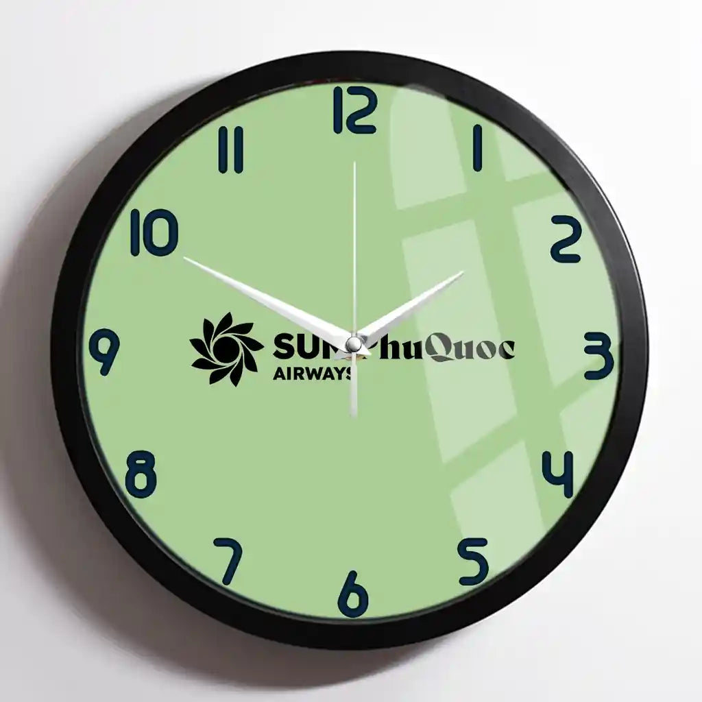 Sun Phu Quoc Airways design on light green framed wall clock