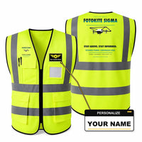 Thumbnail for Fotokite Sigma aviation design on fluorescent green high-visibility reflective vest with custom name badge