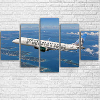 Thumbnail for Frontier Airlines Embraer E190 clean regional jet passage above the Great Lakes canvas - Multiple (5 Panels)