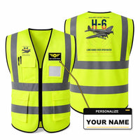 Thumbnail for Heinkel He 111H-6 aviation design on fluorescent green high-visibility reflective vest with custom name badge