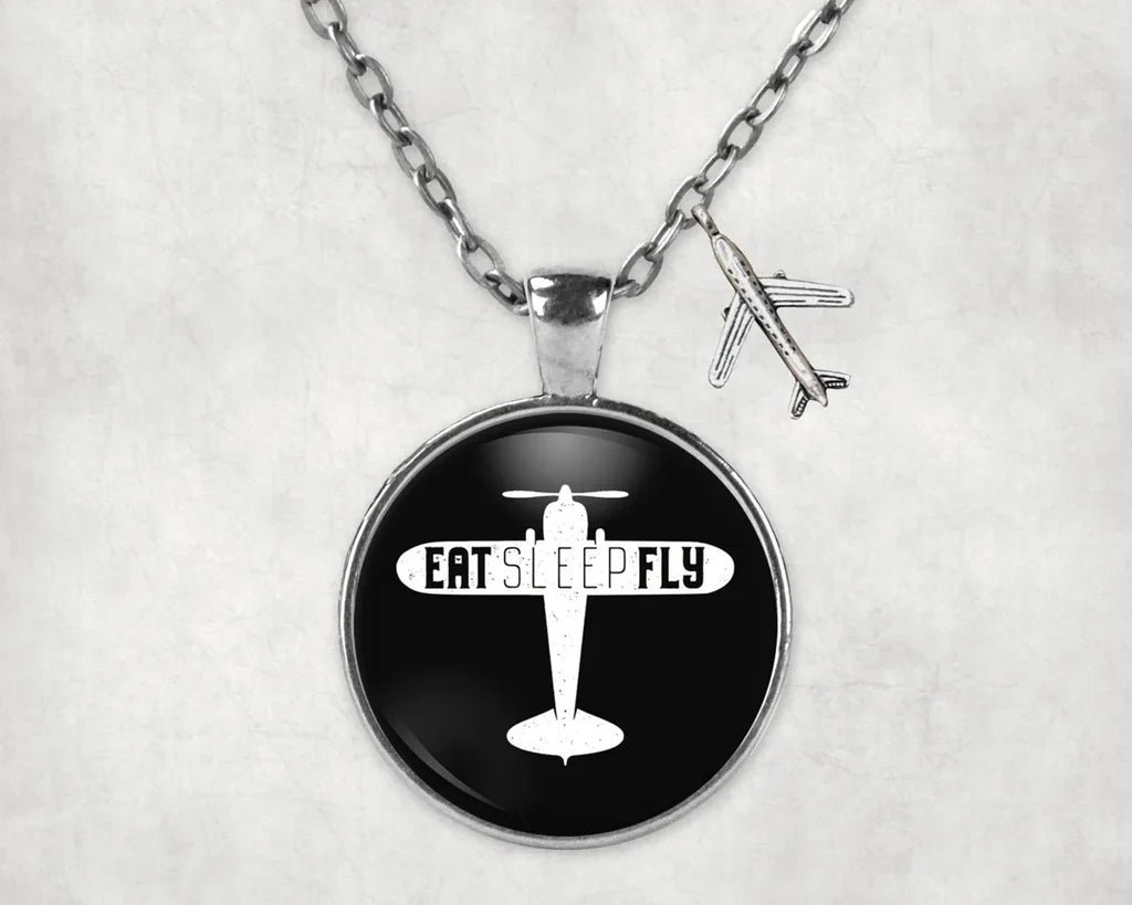 Side view of Eat Sleep Fly & Propeller aviation necklace in stainless steel, polished finish.