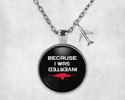 Because I was Inverted aviation-themed necklace, polished stainless steel.