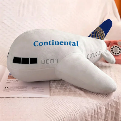 Continental Airlines aviation design on soft polyester filling airplane-shape decorative pillow.