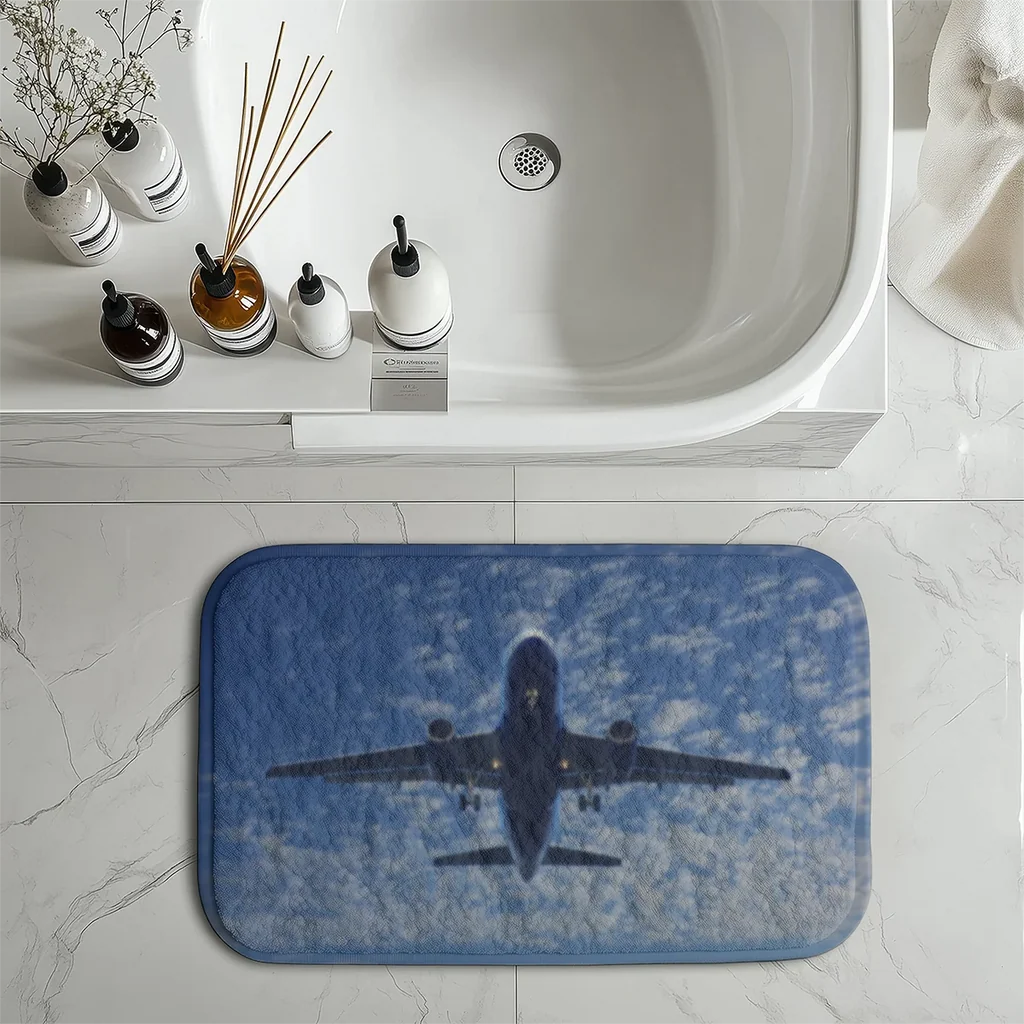 Airplane From Below aviation design on soft absorbent fabric with non-slip backing bath mat.