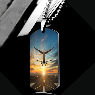 Side view of Airplane over Runway Towards the Sunrise aviation necklace in polished metal, polished finish.