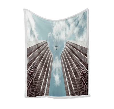Airplane Flying over Big Buildings Bed Blankets & aviation print on soft fleece blanket.
