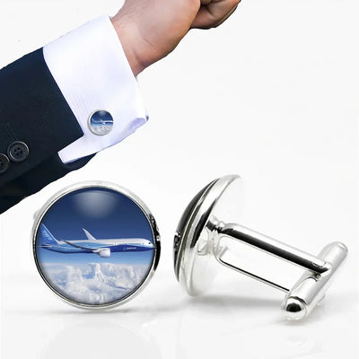 Boeing 787 Dreamliner aviation cuff links, polished metal body with engraved detail.