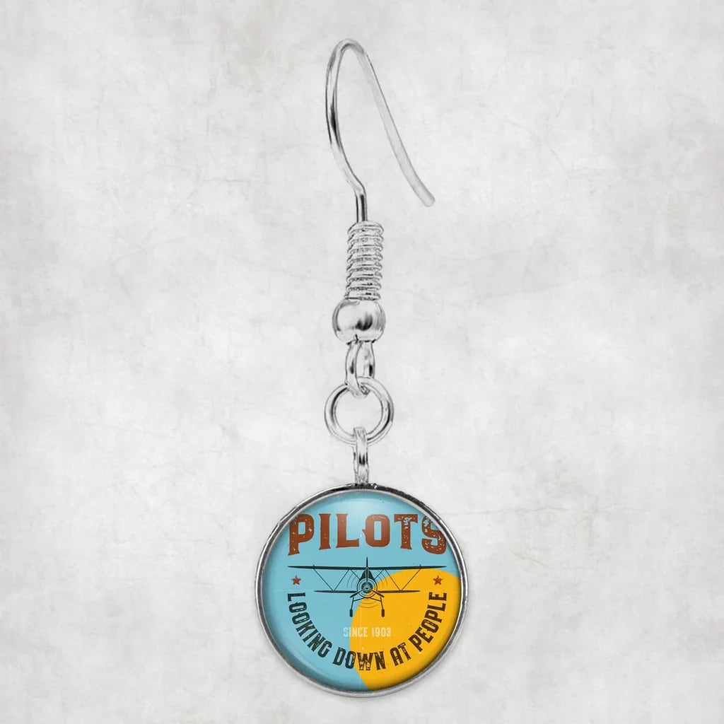 Pilots Looking Down at People Since 1903 aviation earrings, hypoallergenic alloy body with engraved detail.