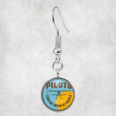 Pilots Looking Down at People Since 1903 aviation earrings, hypoallergenic alloy body with engraved detail.