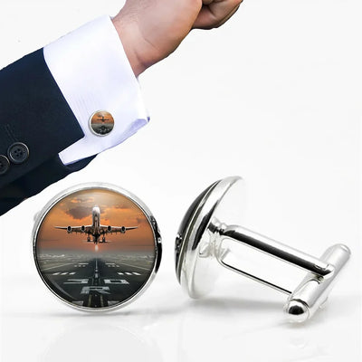 Aircraft Departing from RW30 aviation-themed cuff links, polished metal.