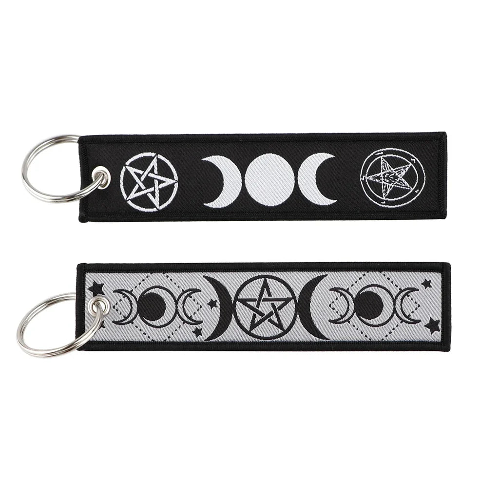 Mystic Moon & Star Spell aviation fashion key chain in polished metal.