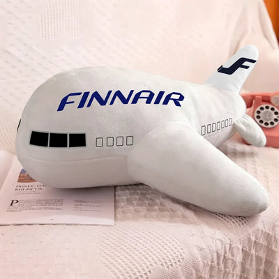 Finnair Airlines aviation design on soft polyester filling airplane-shape decorative pillow.