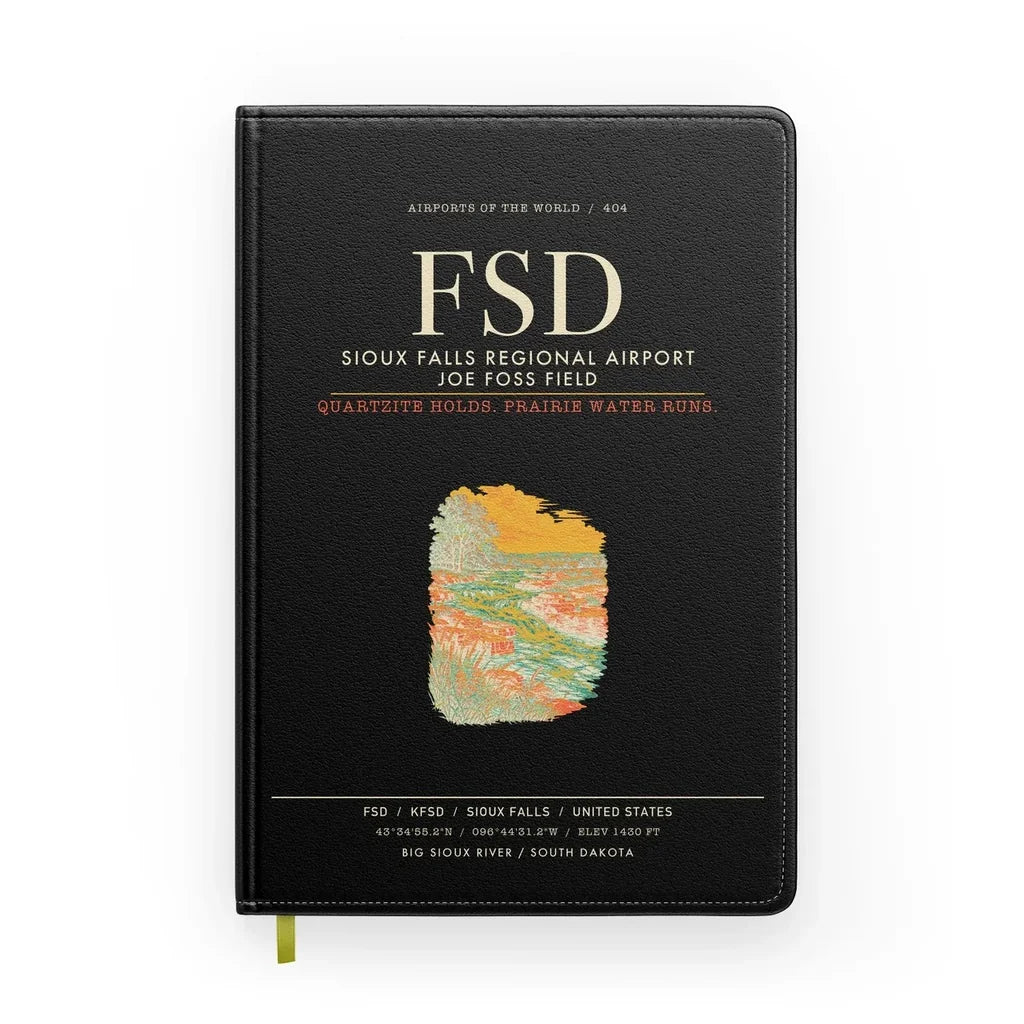 Sioux Falls Regional Airport Joe Foss Field (FSD) design on black notebook