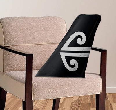 Air New Zealand aviation design on soft polyester filling aircraft tail pillow.