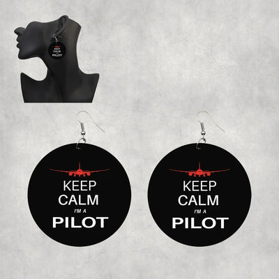 Pilot (777 Silhouette) aviation-themed drop earrings, polished wood with metal hooks.