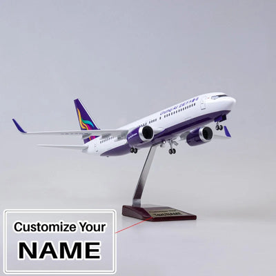 Side view of Urumqi Airline Boeing 737-MAX Airplane Model (1/84 Scale - 47CM) aviation LED model airplane in diecast metal wi.