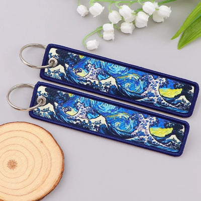 The Great Wave off Kanagawa aviation fashion key chain in polished metal.