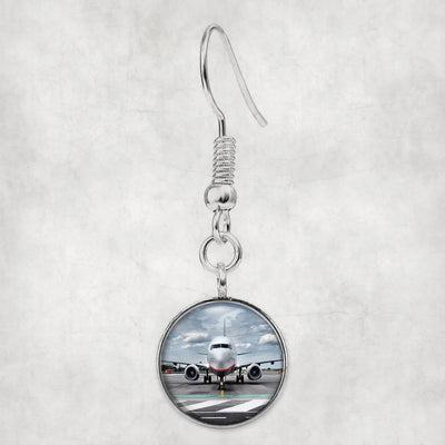 Side view of Amazing Clouds and Boeing 737 NG aviation earrings in hypoallergenic alloy, polished finish.