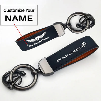 Side view of Air New Zealand Airlines aviation horseshoe-buckle key chain in polished metal alloy, polished finish.