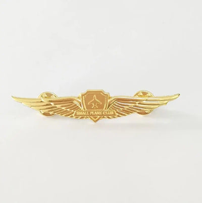Small Airplane Club aviation print badge, polished metal.