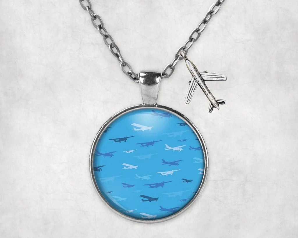 Side view of Many Propellers aviation necklace in stainless steel, polished finish.