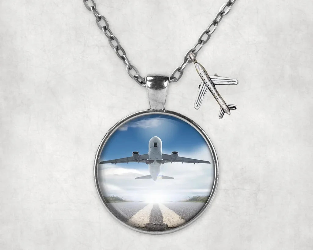 Side view of Taking off Aircraft aviation necklace in stainless steel, polished finish.