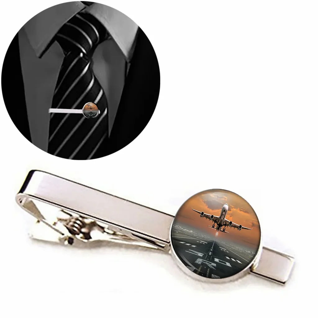 Aircraft Departing from RW30 aviation tie clip, stainless steel body with engraved detail.