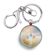 Thumbnail for Airplane Flying Over Runway aviation circle key chain, stainless-steel disc.