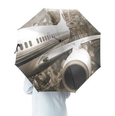 Departing Aircraft & City Scene behind aviation design on windproof polyester umbrella.